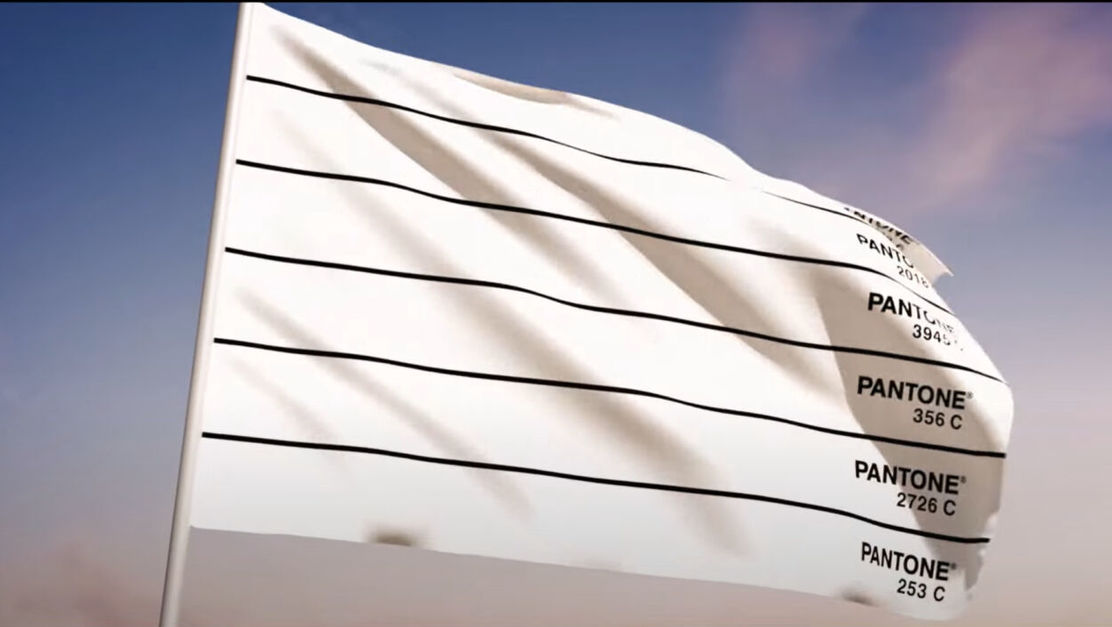A white flag with six stripes, each labeled with the pantone color of the rainbow colors.