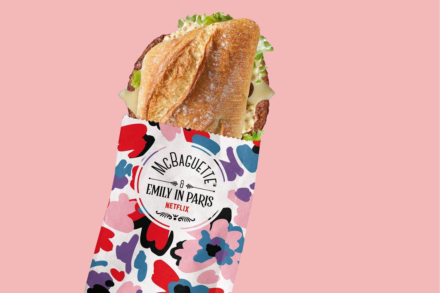 a baguette sandwich in packaging that says "McBaguette from Emily in Paris"