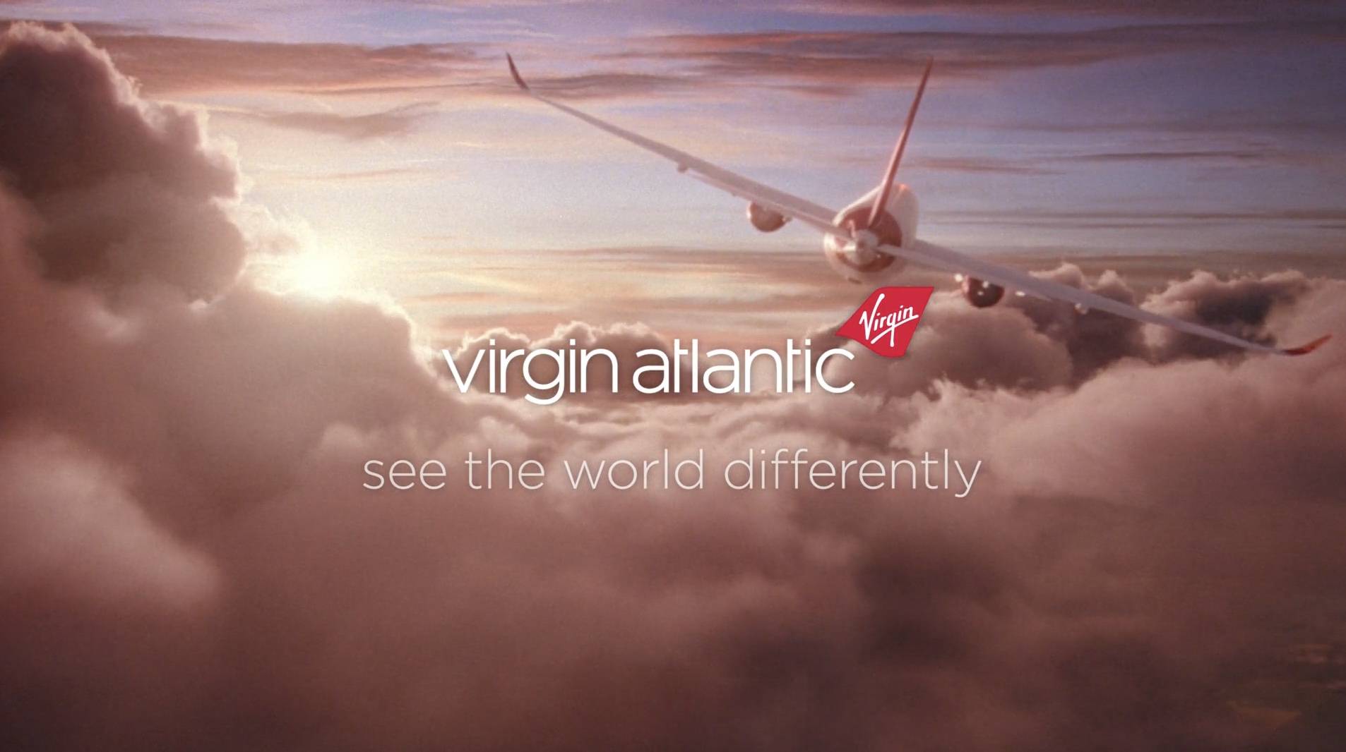 Screen Shot 2023-06-15 at 12.37.44 PM Virgin Atlantic plane flying through the clouds with white copy that reads