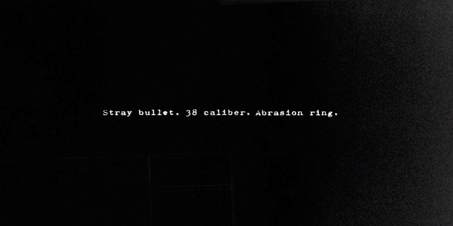 Black background that reads: Stray bullet. 38 caliber. Abrasion ring