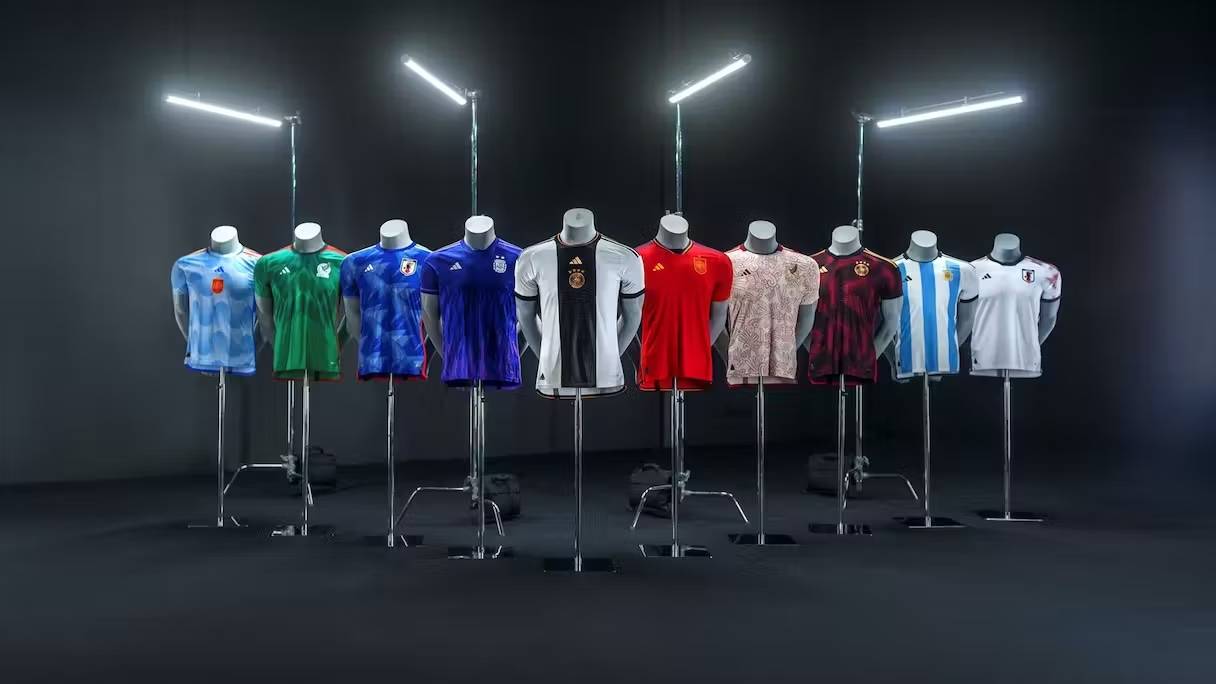 Ten mannequins are dressed with the national soccer jerseys of ten national soccer teams, against a plain black background