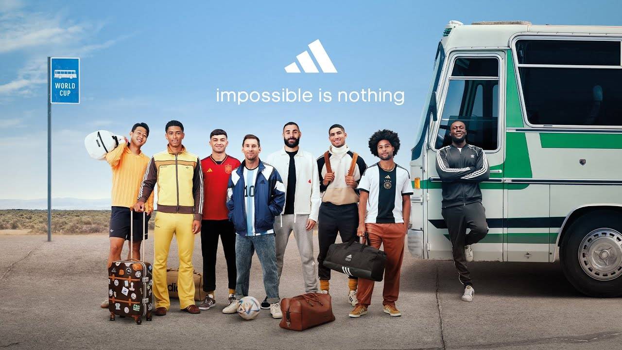Image of football stars from various teams outside of a bus on their way to the World Cup