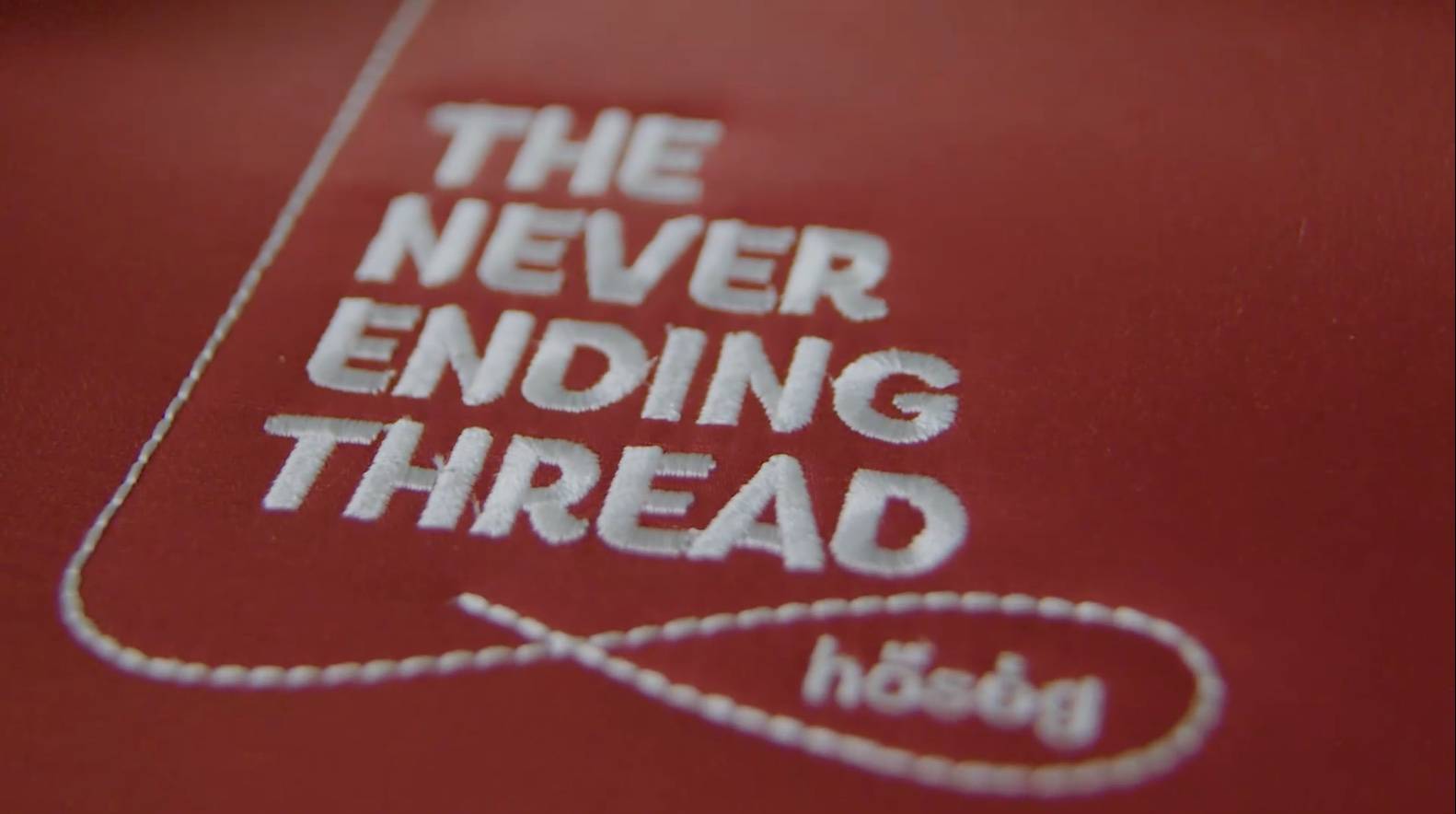 the neverending thread embroidered on a jacket